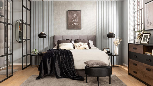 Atmospheric bedroom in dark colours